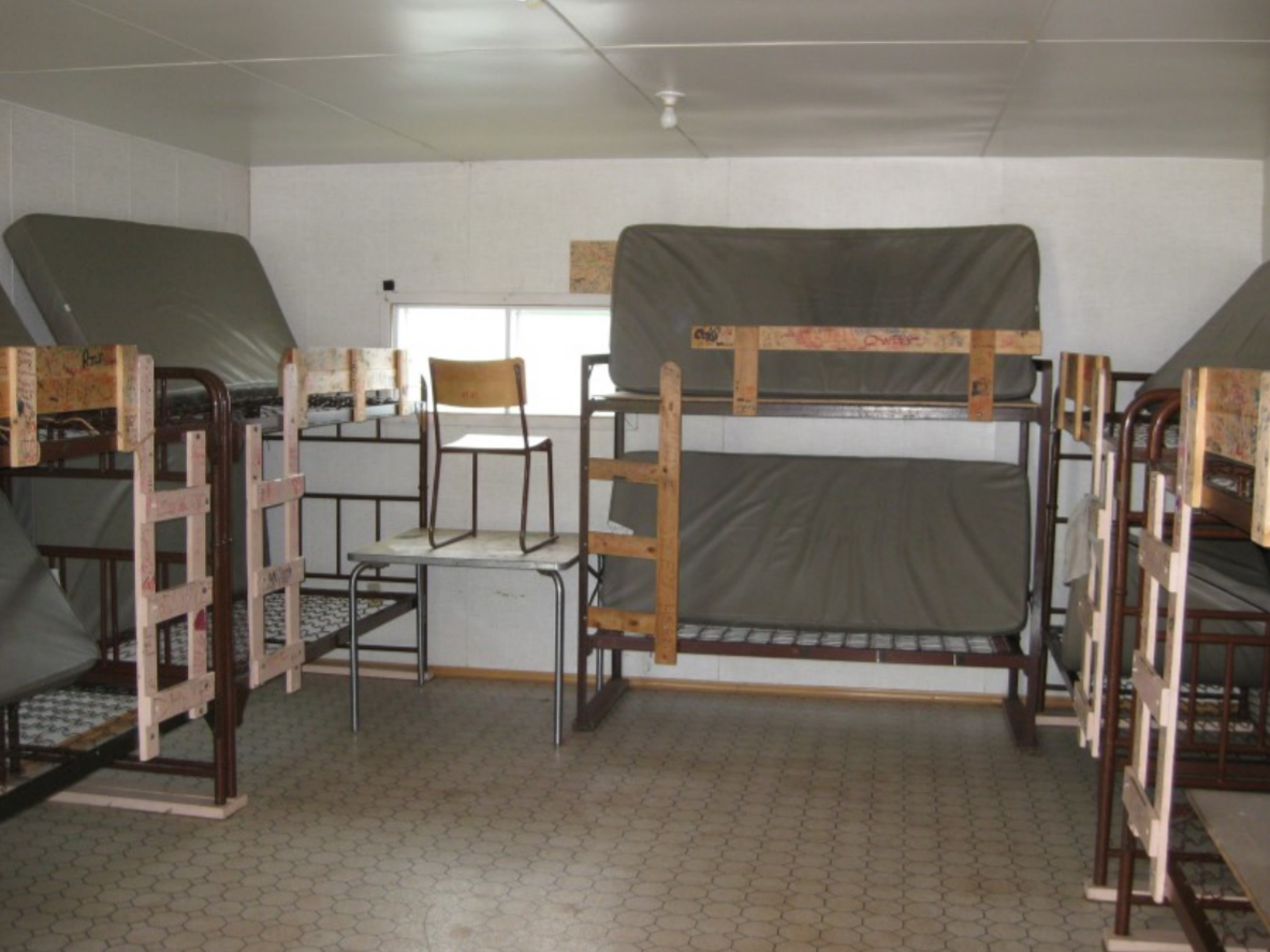 inside of a cabin with bunk beds